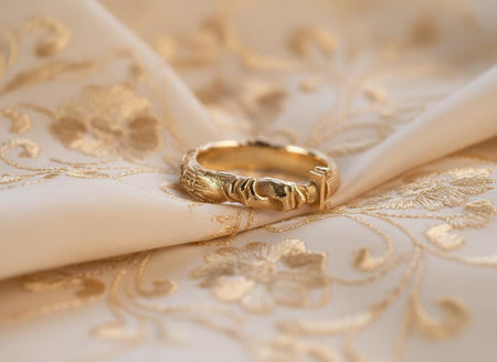 The Fede coalition ring is reimagined in 18k Yellow Gold. The transformation turns the "Silver Statue" into a "Golden pact." The warm metal makes the hands look like a detail from a Renaissance painting or a Roman gold ring. This version feels opulent, classic, and timeless, perfect for a wedding band that honors tradition with a unique twist. (etsy image id: 7452415630)