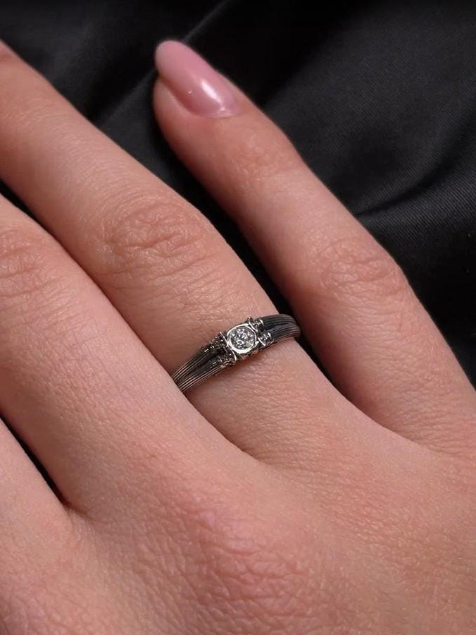 A handcrafted sterling silver ring inspired by ancient Greek architecture, featuring vertical column grooves and a raised stone bezel. The Art Deco influence enhances the structured design, giving it a refined yet historical appearance. Excellent for proposal moments, themed weddings, or collectors who love architectural motifs in fine jewelry. (etsy image id: 6163725531)