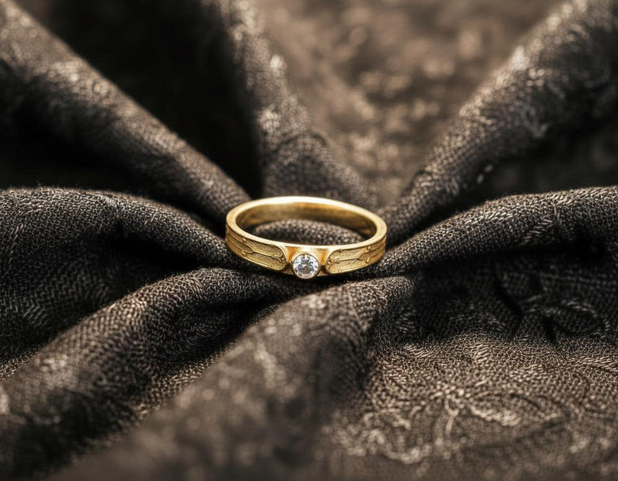 This gothic sterling silver ring features a vivid red garnet set in a detailed medieval-inspired band with darkened textures and graceful, pointed motifs. Designed for lovers of fantasy, gothic fashion, and artisan jewelry, it offers an elegant yet dramatic look. Perfect as a unique wedding band, engagement ring, or statement piece for anyone drawn to symbolic and timeless gothic style. (etsy image id: 7425901470)