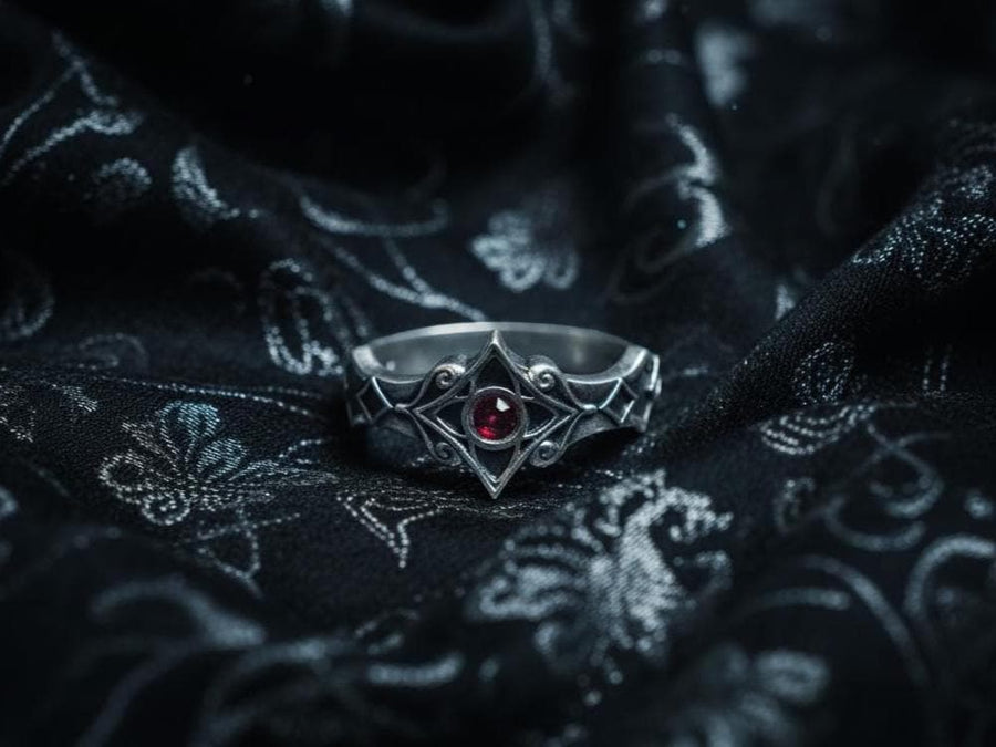 Sterling Silver Gothic Ring, Handcrafted Gemstone Band with Medieval Elegance, Unique Wedding Ring or Gift, Gothic Heritage Elegant Gift, The image highlights the contrast between the gemstone and the metal. The red stone has a deep, bloody saturation that catches the light. The 925 sterling silver has a vintage, oxidized finish, giving it the appearance of an ancient artifact rather than a brand-new factory piece. The metalwork looks delicate bu (etsy image id: 7102074108)