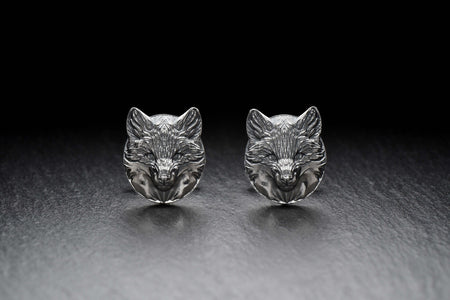 May include: A pair of silver fox head cufflinks. The cufflinks are round and feature a detailed fox head design. (etsy image id: 7689621560)