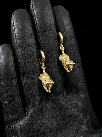 Reimagined in solid 14k yellow gold, these quirky opossum earrings transform from feral woodland creatures into radiant, sunlit treasures. The warm golden metal highlights the intricate fur and fierce facial details, giving the marsupials an opulent glow. The deep recesses feature a soft matte finish rather than black oxidation, creating a luxurious contrast that elevates this unconventional animal motif into a masterpiece of fine jewelry.