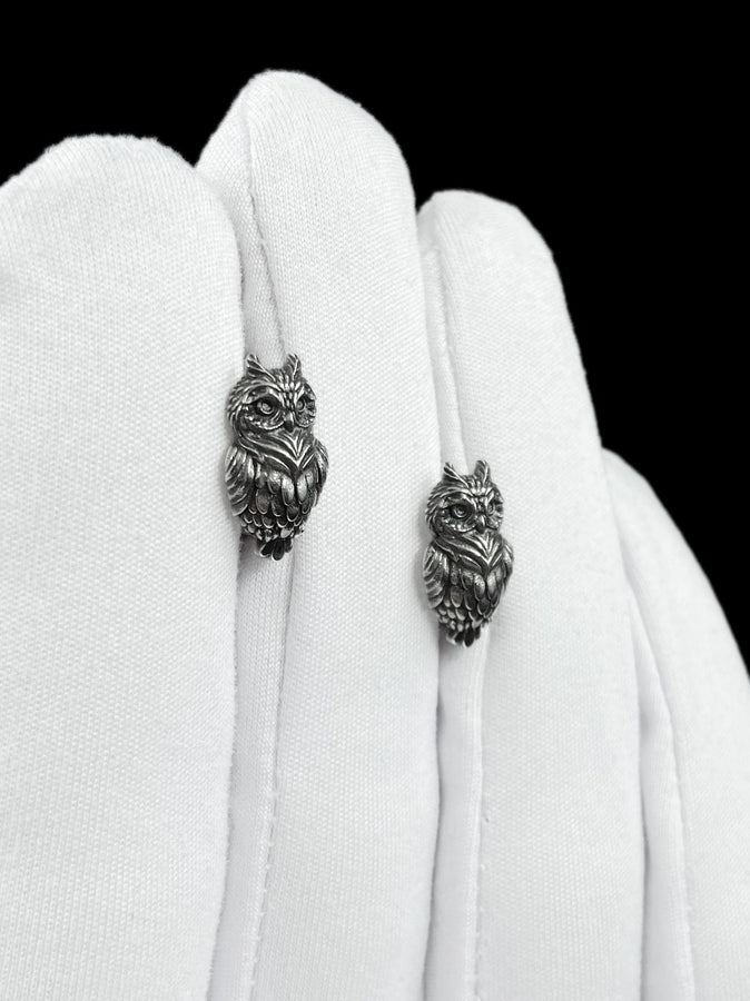 These sterling silver owl stud earrings embody quiet wisdom and natural elegance, crafted with intricate feather detailing that brings each tiny owl to life. Designed for those who feel connected to nature and symbolism, they offer a subtle yet meaningful statement you can wear every day. (etsy image id: 8029379729)
