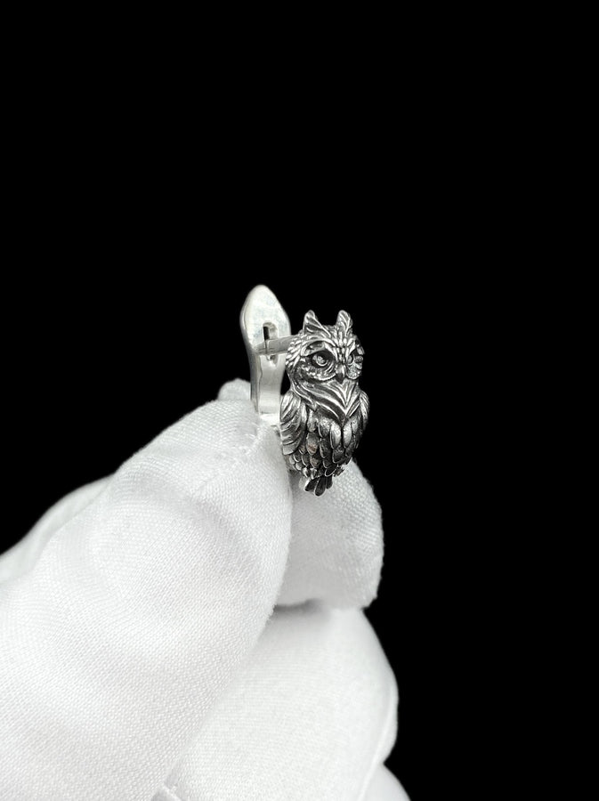 These sterling silver owl stud earrings embody quiet wisdom and natural elegance, crafted with intricate feather detailing that brings each tiny owl to life. Designed for those who feel connected to nature and symbolism, they offer a subtle yet meaningful statement you can wear every day. (etsy image id: 8029379729)
