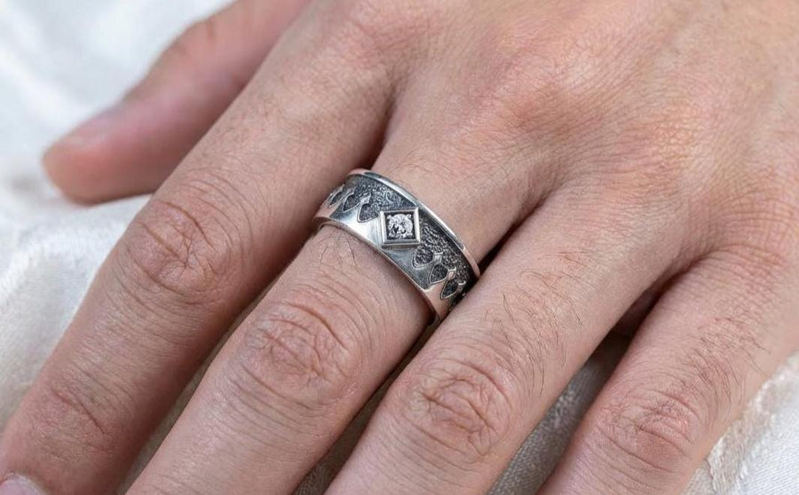 Bathed in soft, romantic light against elegant white silk, this alternative bridal set perfectly balances dark gothic architecture with traditional wedding luxury. The rings evoke a mysterious, dark academia atmosphere, capturing the timeless beauty of ancient stone cathedrals and eternal devotion. Designed for modern couples who appreciate history and non-traditional aesthetics, this matching wedding set is a profound symbol of a love story root (etsy image id: 7928015292)