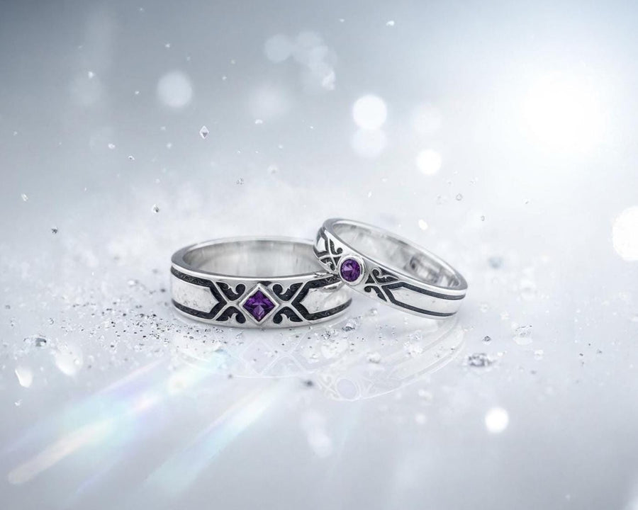 A professional studio photograph of a matching two-piece sterling silver wedding ring set. Both rings feature a prominent, raised Greek-style cross motif in the center, which holds a round, bezel-set white crystal. The interior of the cross arms has a fine, cross-hatched grid texture. Along the sides of the high-polished silver bands are recessed, four-lobed quatrefoil shapes. The rings are presented against a pitch-black background, making the p __etsy:8051335185