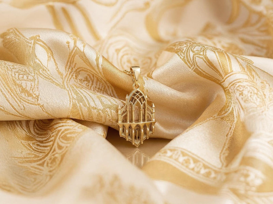 This macro image highlights the masterful craftsmanship of the solid 925 sterling silver casting. The artisan has flawlessly translated monumental stone architecture into miniature metalwork. The columns are smooth and precise, while deep sulfur oxidation creates a permanent matte black shadow in the open recesses of the arches. This traditional antiquing technique gives the gothic relic pendant the weathered, enduring texture of an actual historical cathedral fragment. (etsy image id: 7979026828)