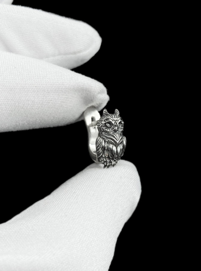 These sterling silver owl stud earrings embody quiet wisdom and natural elegance, crafted with intricate feather detailing that brings each tiny owl to life. Designed for those who feel connected to nature and symbolism, they offer a subtle yet meaningful statement you can wear every day. (etsy image id: 8029379729)