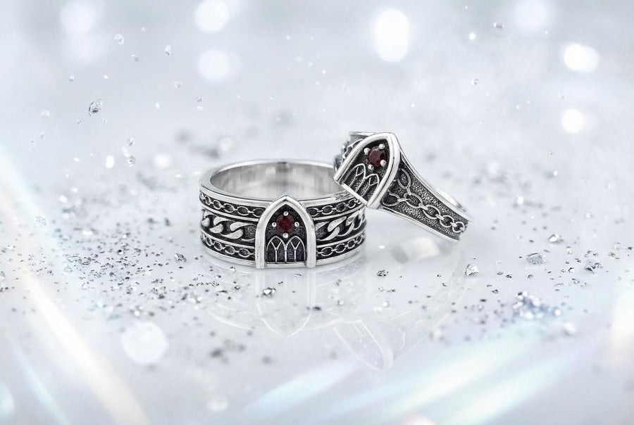 A professional studio photograph of a matching two-piece sterling silver wedding ring set. Both rings feature a prominent, raised Greek-style cross motif in the center, which holds a round, bezel-set white crystal. The interior of the cross arms has a fine, cross-hatched grid texture. Along the sides of the high-polished silver bands are recessed, four-lobed quatrefoil shapes. The rings are presented against a pitch-black background, making the p __etsy:8051335185
