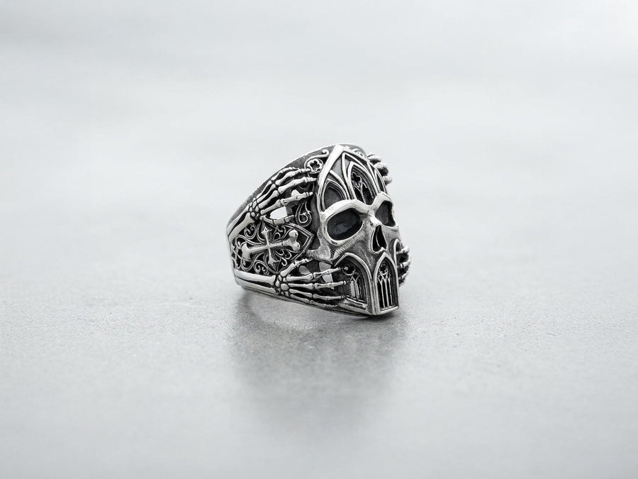 Crafted from premium solid 925 sterling silver, this substantial ring demonstrates the visual impact of an oxidized patina. The antiquing treatment settles into the microscopic crevices of the detailed gothic tracery and side cross engraving, providing a permanent shadow and an ancient, textured character.