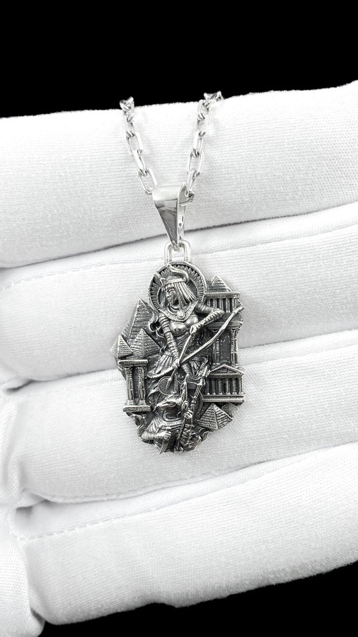 Designed as a substantial unisex statement piece, this highly detailed pendant is ideal for daily wear or as a specialized gift. The ancient aesthetic appeals strongly to lovers of history, mythology, and classic art deco styling.