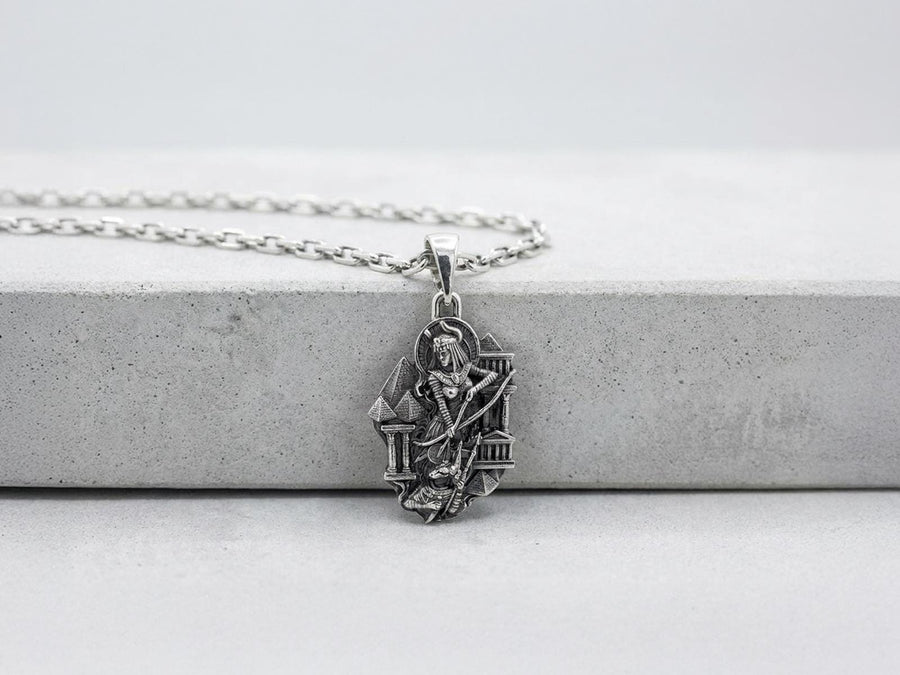 Designed as a substantial unisex statement piece, this highly detailed pendant is ideal for daily wear or as a specialized gift. The ancient aesthetic appeals strongly to lovers of history, mythology, and classic art deco styling.