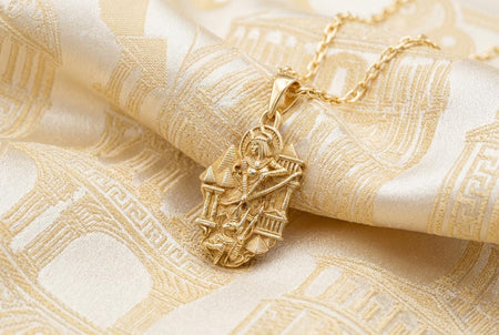 Reimagined in opulent 18k solid yellow gold, this Egyptian mythology pendant transforms into a radiant sunlit artifact. The warm tones illuminate the queen, Anubis, and pyramids. A subtle matte finish replaces the dark oxidation in the crevices.