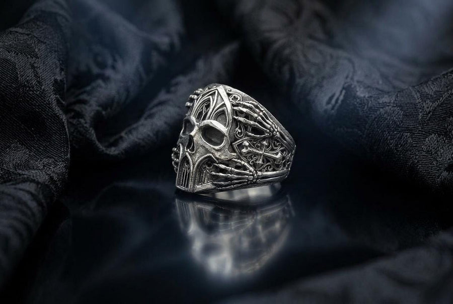 Crafted from premium solid 925 sterling silver, this substantial ring demonstrates the visual impact of an oxidized patina. The antiquing treatment settles into the microscopic crevices of the detailed gothic tracery and side cross engraving, providing a permanent shadow and an ancient, textured character.