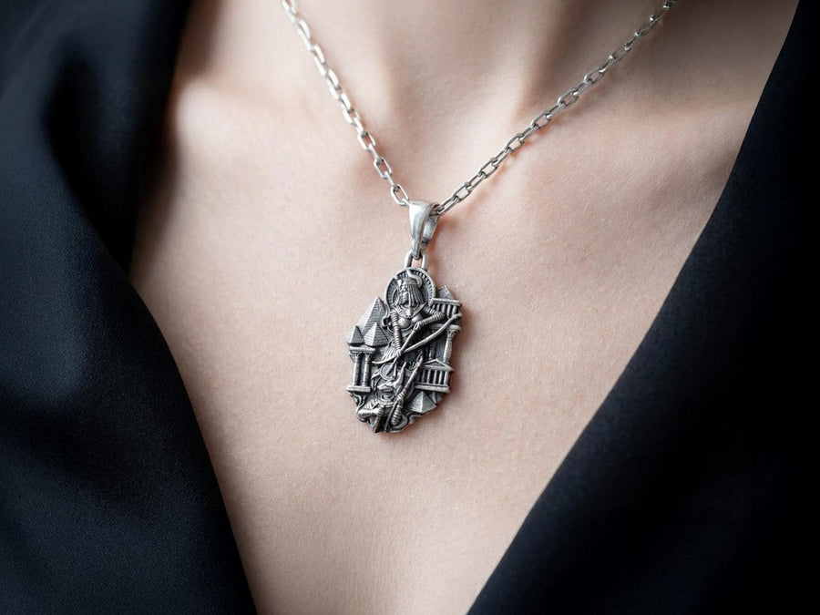 Designed as a substantial unisex statement piece, this highly detailed pendant is ideal for daily wear or as a specialized gift. The ancient aesthetic appeals strongly to lovers of history, mythology, and classic art deco styling.