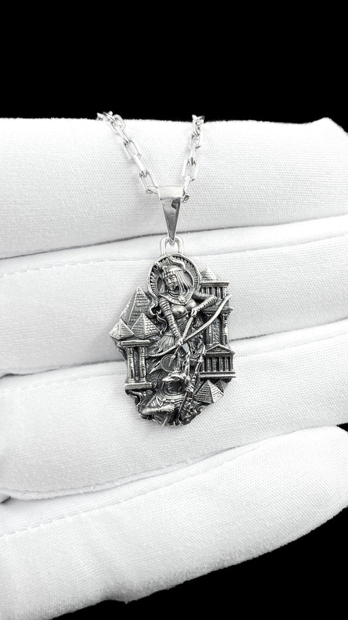 Designed as a substantial unisex statement piece, this highly detailed pendant is ideal for daily wear or as a specialized gift. The ancient aesthetic appeals strongly to lovers of history, mythology, and classic art deco styling.