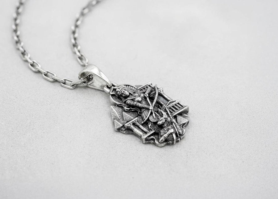 Designed as a substantial unisex statement piece, this highly detailed pendant is ideal for daily wear or as a specialized gift. The ancient aesthetic appeals strongly to lovers of history, mythology, and classic art deco styling.
