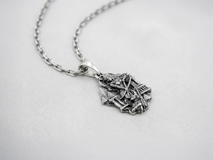 Designed as a substantial unisex statement piece, this highly detailed pendant is ideal for daily wear or as a specialized gift. The ancient aesthetic appeals strongly to lovers of history, mythology, and classic art deco styling.