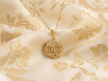 Reimagined in opulent 18k solid yellow gold, this Greek mythology pendant transforms into a radiant sunlit artifact. The warm tones illuminate Zeus, Poseidon, Athena, and the temple. A subtle matte finish replaces the dark oxidation.