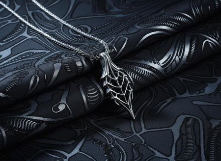 Handcrafted from solid 925 Sterling Silver with a deep oxidized finish.
