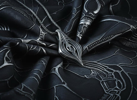Solid 925 Sterling Silver with a deep oxidized finish to highlight the flowing biomechanical lines.e shipping.