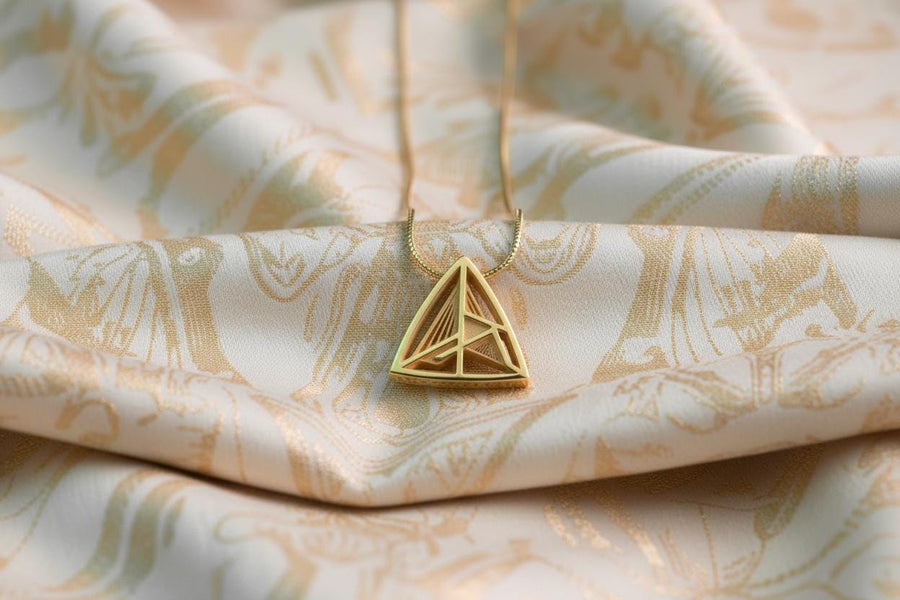 Embrace the structural elegance of modern ruins and sacred geometry. This architectural silver triangle pendant is a bold statement piece, designed for those who find beauty in precise lines and open space. Crafted from 925 sterling silver, the necklace features a complex, three-dimensional geometric framework that creates a captivating optical depth, making it a true centerpiece of alternative jewelry. The avant-garde triangular design features