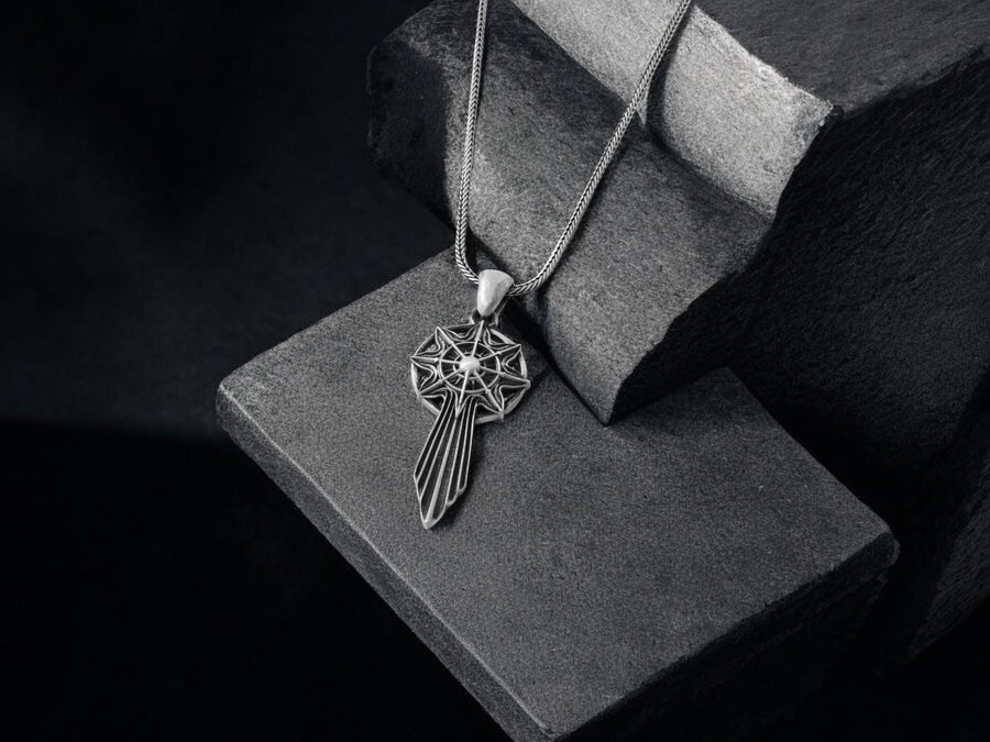 Unlock the aesthetic of ancient battles and celestial navigation with this solid 925 sterling silver sword compass pendant. Inspired by dark fantasy lore and esoteric warrior artifacts, this avant-garde piece features a striking eight-pointed star merging into a sleek, grooved blade silhouette. A profound avant-garde statement piece perfect for medieval, gothic, and techwear styles.