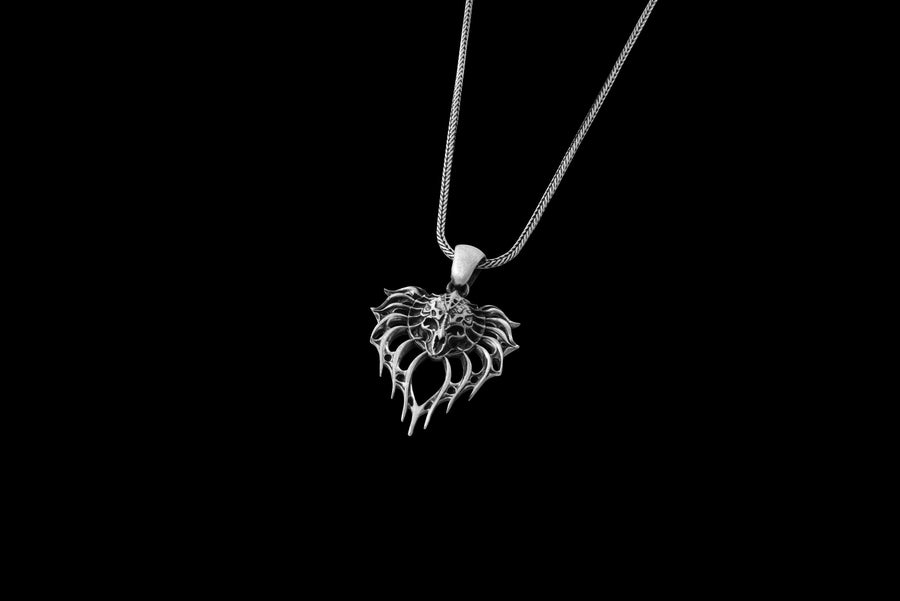 Handcrafted from solid 925 Sterling Silver with a deep oxidized finish to highlight its intricate, monstrous details.