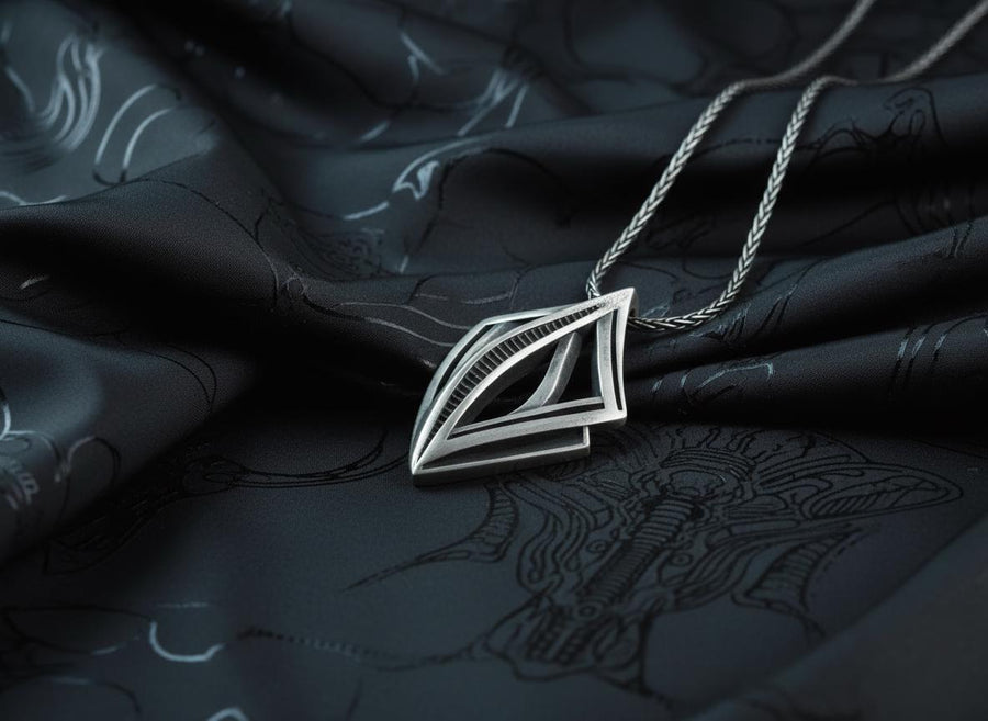 Dark sci-fi silver rhombus pendant glowing softly amid smoke, showcasing a 3D architectural design with parallel inner beams.