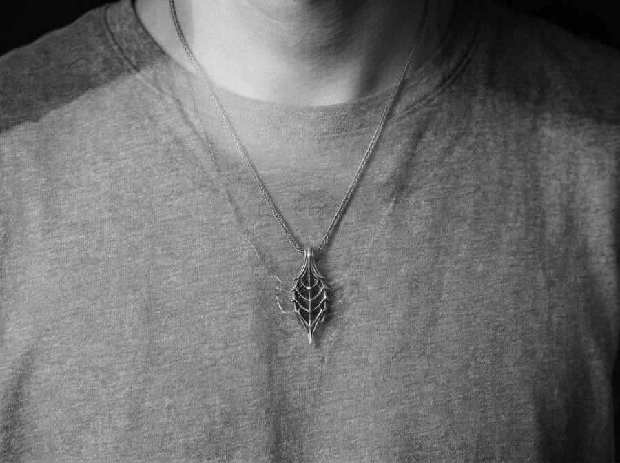 Intricate wireframe skeleton leaf design inspired by dark fantasy lore.