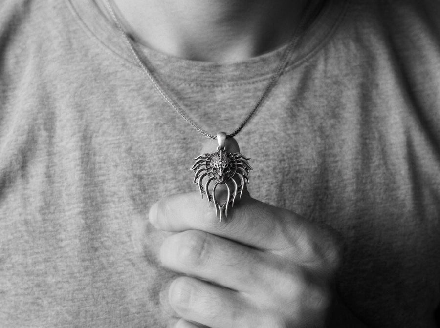 Handcrafted from solid 925 Sterling Silver with a deep oxidized finish to highlight its intricate, monstrous details.