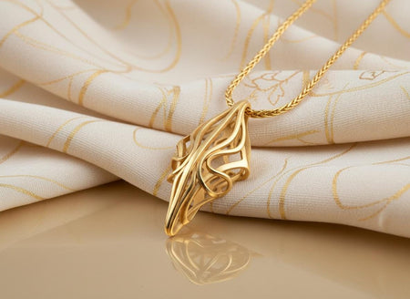 24K Gold Coating available to highlight the flowing architectural lines. Reimagined in 18k solid yellow gold, this abstract avant-garde pendant transforms into a radiant sunlit artifact. The warm tones illuminate the sweeping internal curves and sharp interlocking edges. A subtle matte finish gracefully replaces the dark oxidation.