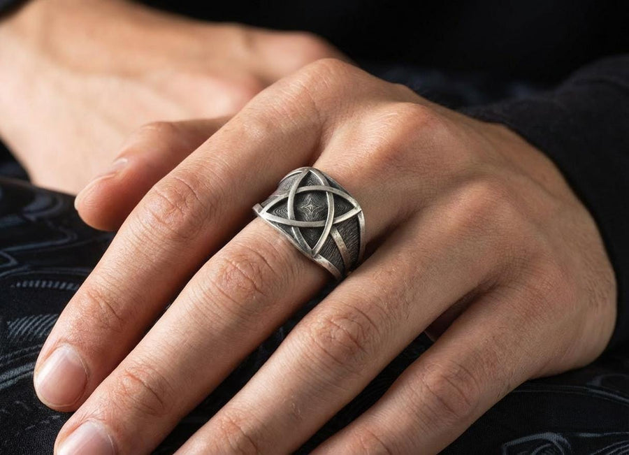 Handcrafted from solid 925 Sterling Silver with a deep oxidized finish to accentuate its textured details.