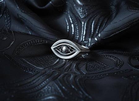 Handcrafted from solid 925 Sterling Silver with a deep oxidized finish to accentuate the eye motif.