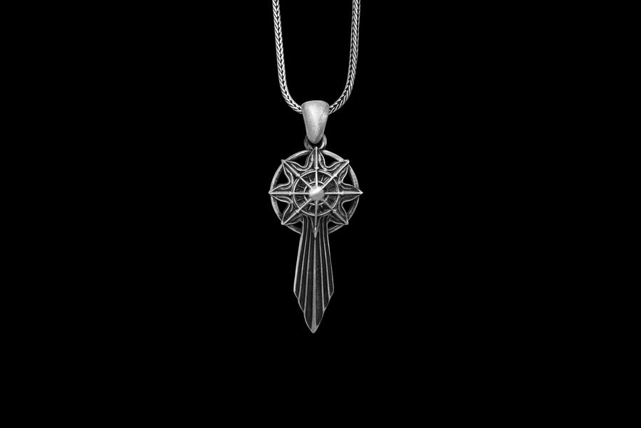 Unlock the aesthetic of ancient battles and celestial navigation with this solid 925 sterling silver sword compass pendant. Inspired by dark fantasy lore and esoteric warrior artifacts, this avant-garde piece features a striking eight-pointed star merging into a sleek, grooved blade silhouette. A profound avant-garde statement piece perfect for medieval, gothic, and techwear styles.