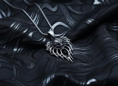 Handcrafted from solid 925 Sterling Silver with a deep oxidized finish to highlight its intricate, monstrous details.