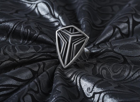 Channel the aesthetic of a high-tech future with this solid 925 sterling silver sci-fi shield ring. Designed with a sleek, low-profile silhouette, this minimalist signet features a sharp geometric crest anchored by deep, oxidized tri-line grooves.