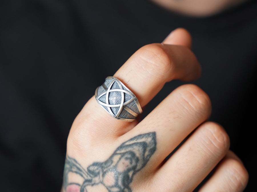 Handcrafted from solid 925 Sterling Silver with a deep oxidized finish to accentuate its textured details.
