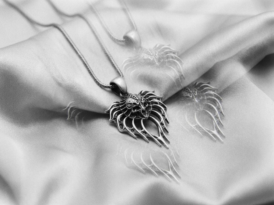 Handcrafted from solid 925 Sterling Silver with a deep oxidized finish to highlight its intricate, monstrous details.