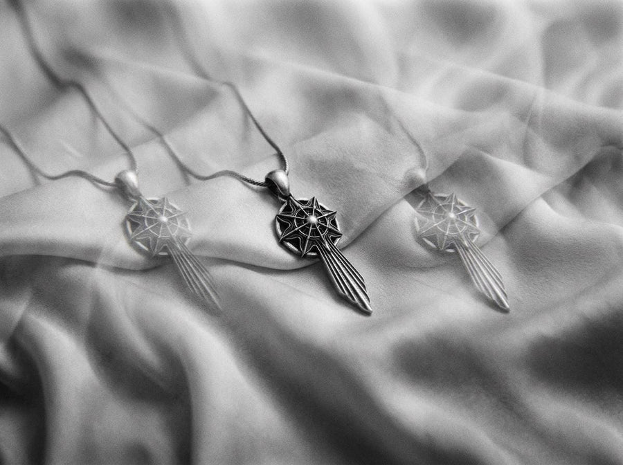 Unlock the aesthetic of ancient battles and celestial navigation with this solid 925 sterling silver sword compass pendant. Inspired by dark fantasy lore and esoteric warrior artifacts, this avant-garde piece features a striking eight-pointed star merging into a sleek, grooved blade silhouette. A profound avant-garde statement piece perfect for medieval, gothic, and techwear styles.