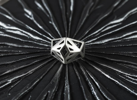 Make a bold structural statement with this solid 925 sterling silver low-poly ring. Designed like a three-dimensional architectural cage, this brutalist piece features a heavily faceted, open wireframe silhouette that rises prominently off the finger like a geometric prism.