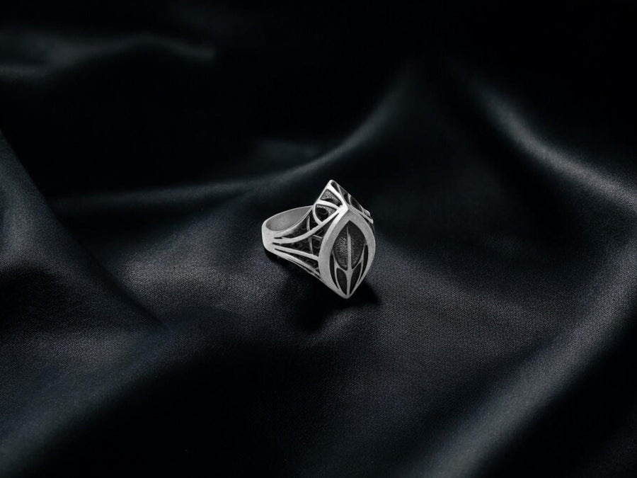 Handcrafted from solid 925 Sterling Silver with a deep oxidized finish to highlight the textured core.