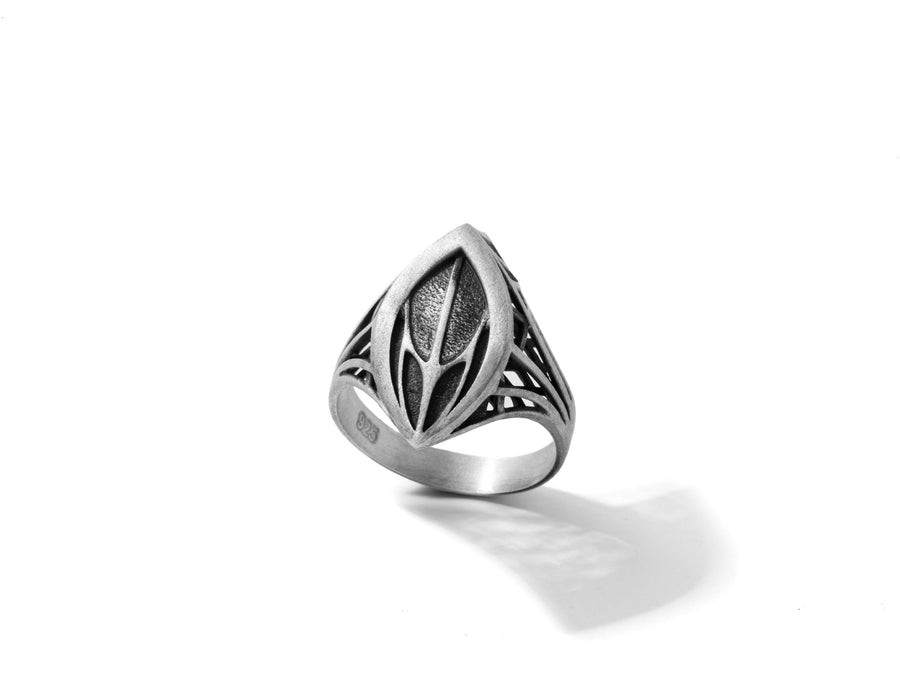 Handcrafted from solid 925 Sterling Silver with a deep oxidized finish to highlight the textured core.
