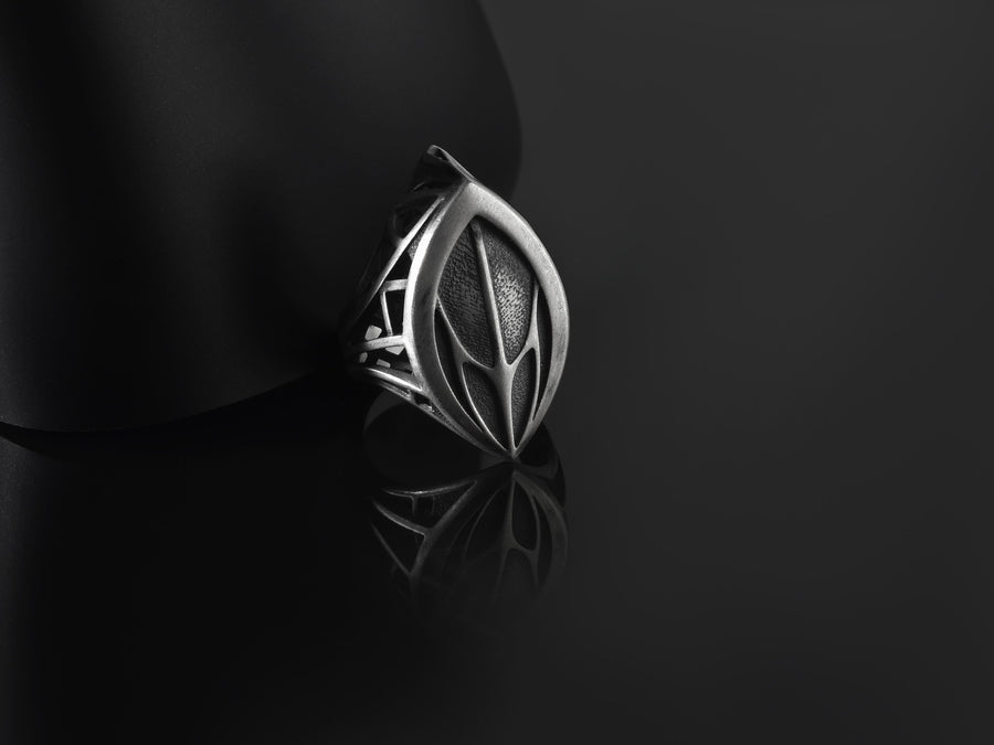 Handcrafted from solid 925 Sterling Silver with a deep oxidized finish to highlight the textured core.