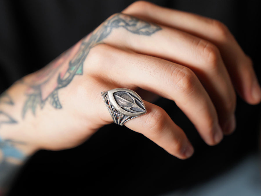 Handcrafted from solid 925 Sterling Silver with a deep oxidized finish to highlight the textured core.